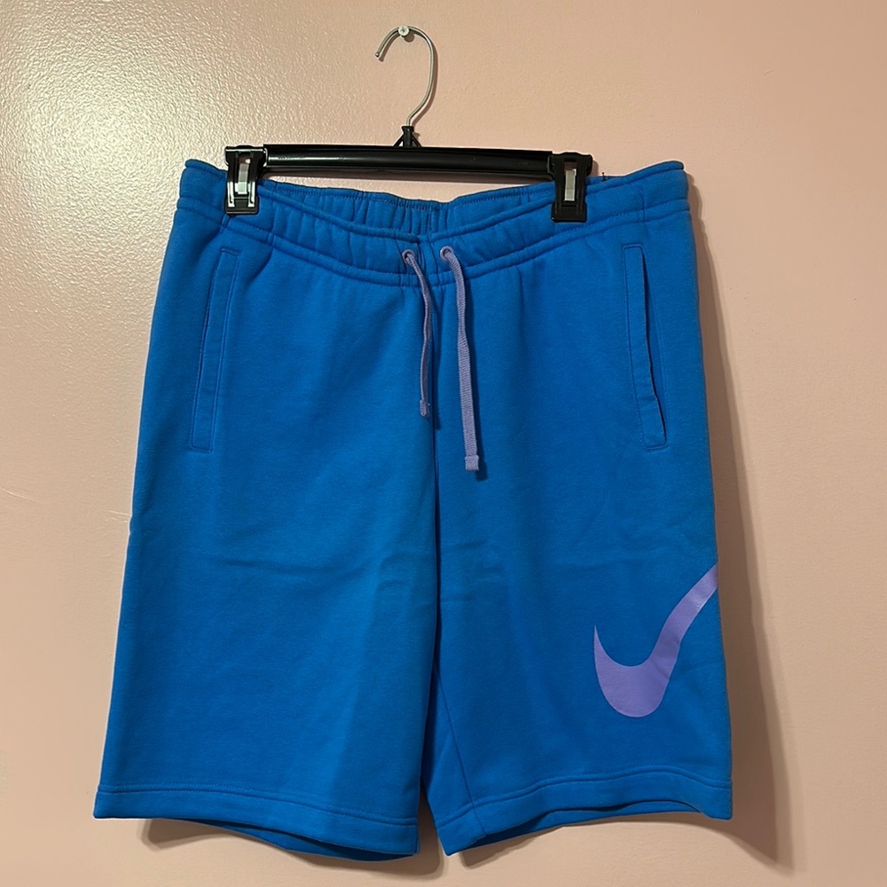 Nike Blue Athletic Shorts with Purple Logo